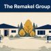 Illustration of two cream ranch homes with dark navy roofs under a Remakel Group banner: the left yard has a SOLD sign, the right a FOR SALE sign, and yellow autumn trees stand between the houses.